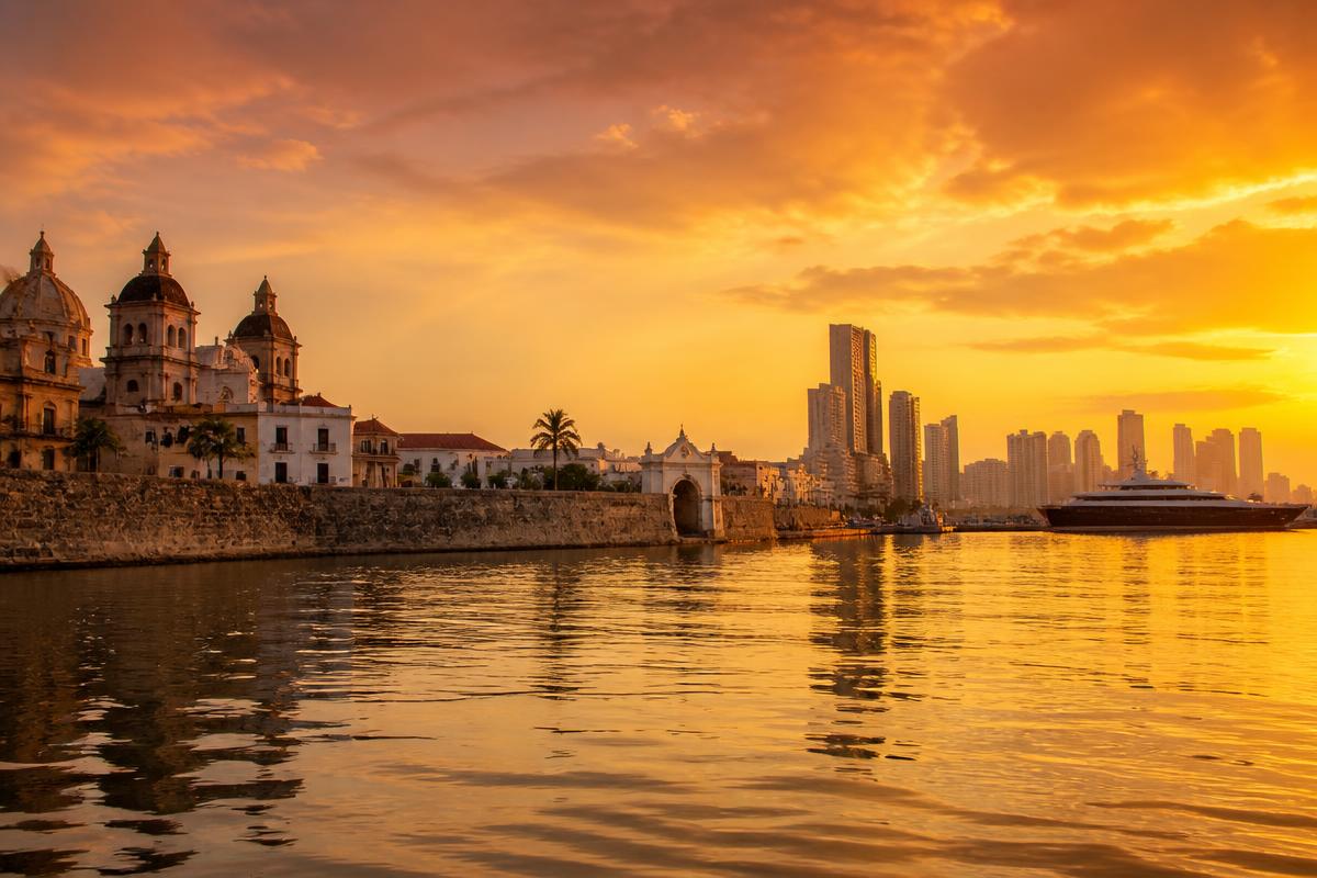 Sunset over the Cartagena skyline and old city walls from the water