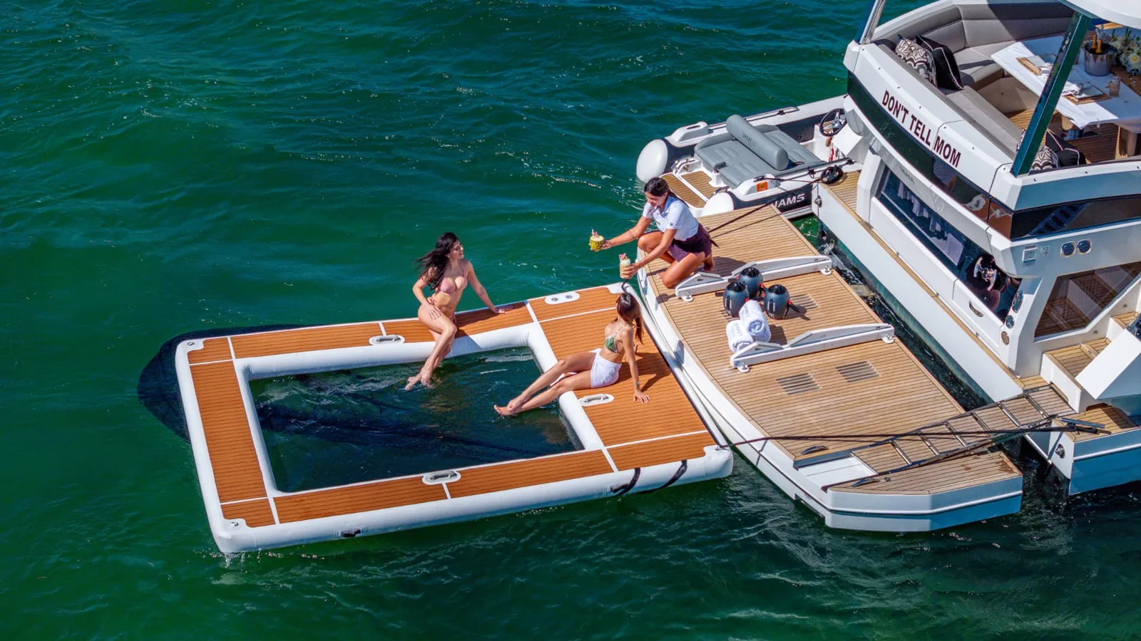 68′ Galeon: Floating water lounge beside the yacht
