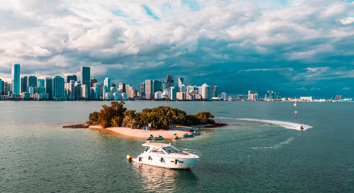 40' Sealine anchored off a sandbar island with the Miami skyline
