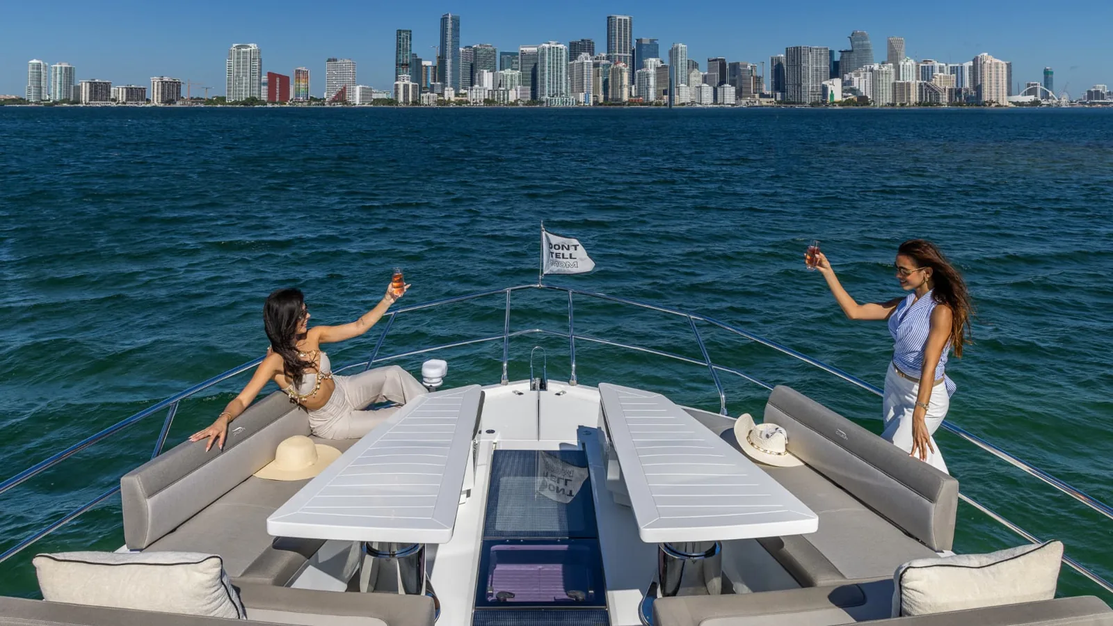 68′ Galeon: Bow sun lounge with Miami skyline